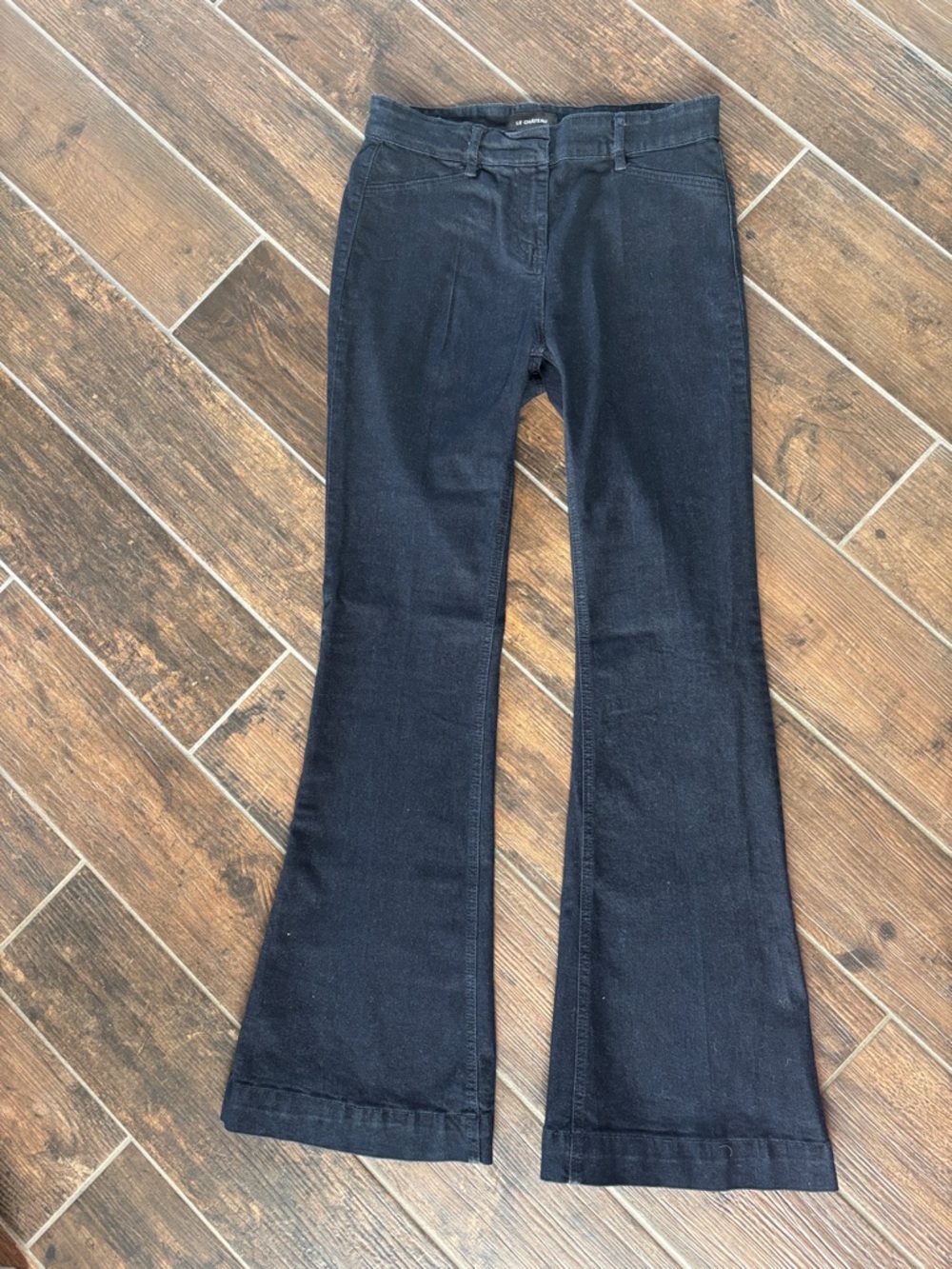 Le Château blue denim flare trousers with stitched label